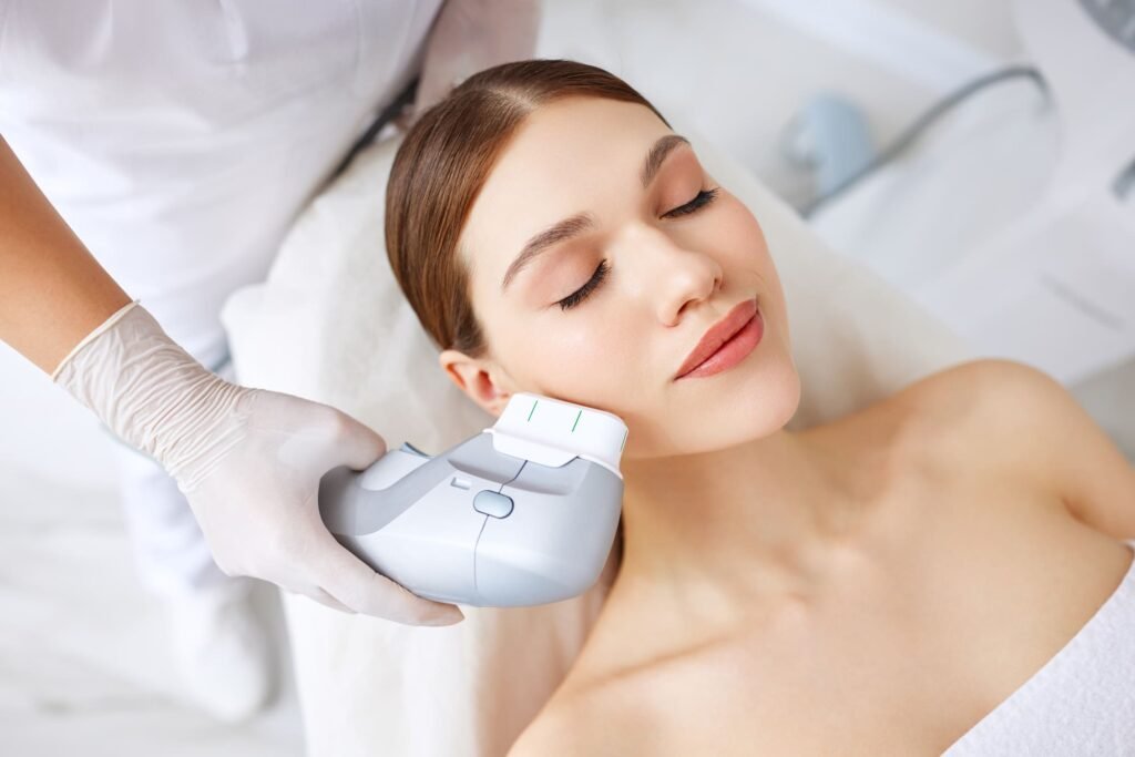 woman getting facial lifting therapy in beauty salon
